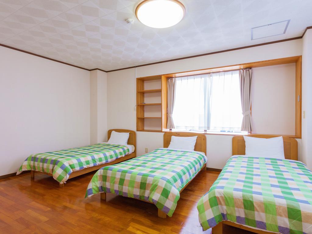 Kariyushi Condominium Resort Sea Side House Nago Esterno foto